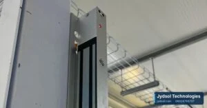 Magnetic lock fitted to a door frame in a data centre