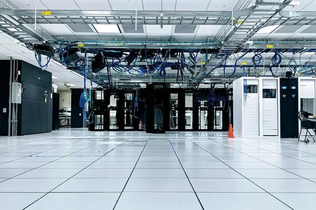 Data centre with server racks on a raised floor