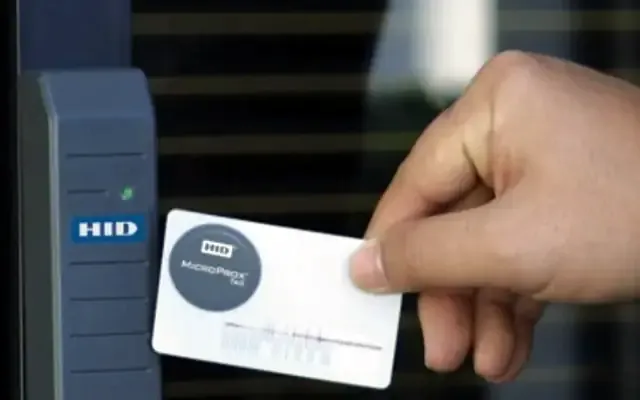 Access card being presented to a door card reader